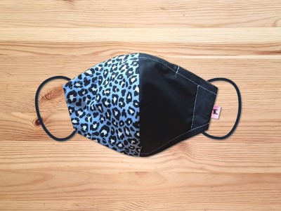 Leopard print cotton face masks with four breathable layers, available in different colors.